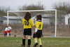 Abrahamian-Family > Stop and smell the flowers... Even during your soccer game.  How can you resist pretty yellow flowers?